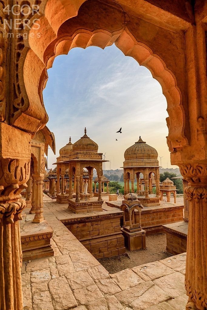 india, rajasthan, jaisalmer, vyas chhatri royal tombs at sunset